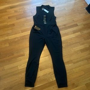 Bebe One piece romper: Low cut to waist.